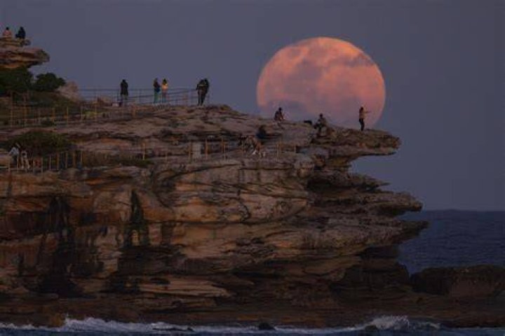 The moon, seen from Bondi Beach, Australia, is seen by some as a sign of the 'coming apocalypse'