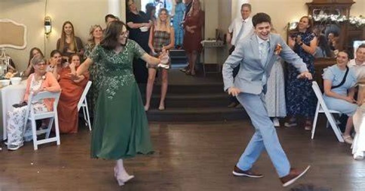 The mother-son duo cheered coconut beverages at a fancy dinner out