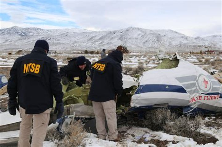  The NTSB inspects the wreckage following the deadly crash