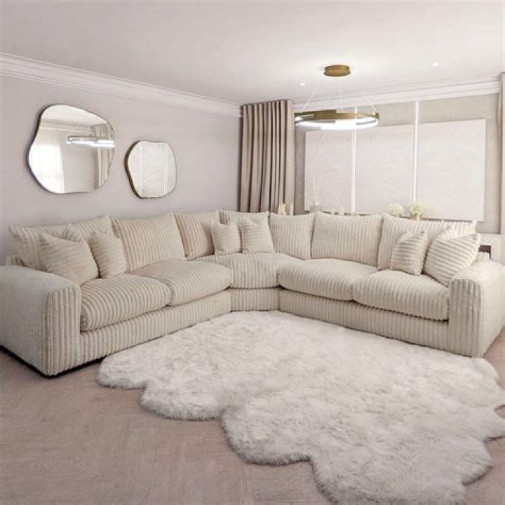 The range includes faux fur rugs, throws, cushions and stools