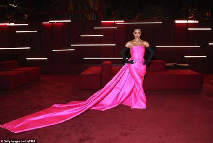 The reality TV star opted for a bright blue dress, which clung to her natural curves in sheer fabric