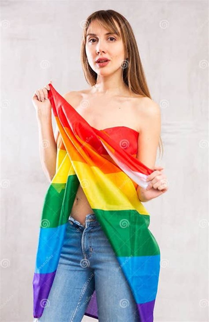 The scantily-clad activist poses for a picture