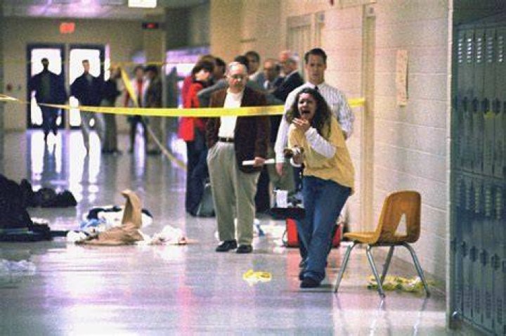 The scene of the shooting is pictured above, showing a discarded shoe by the side of the car