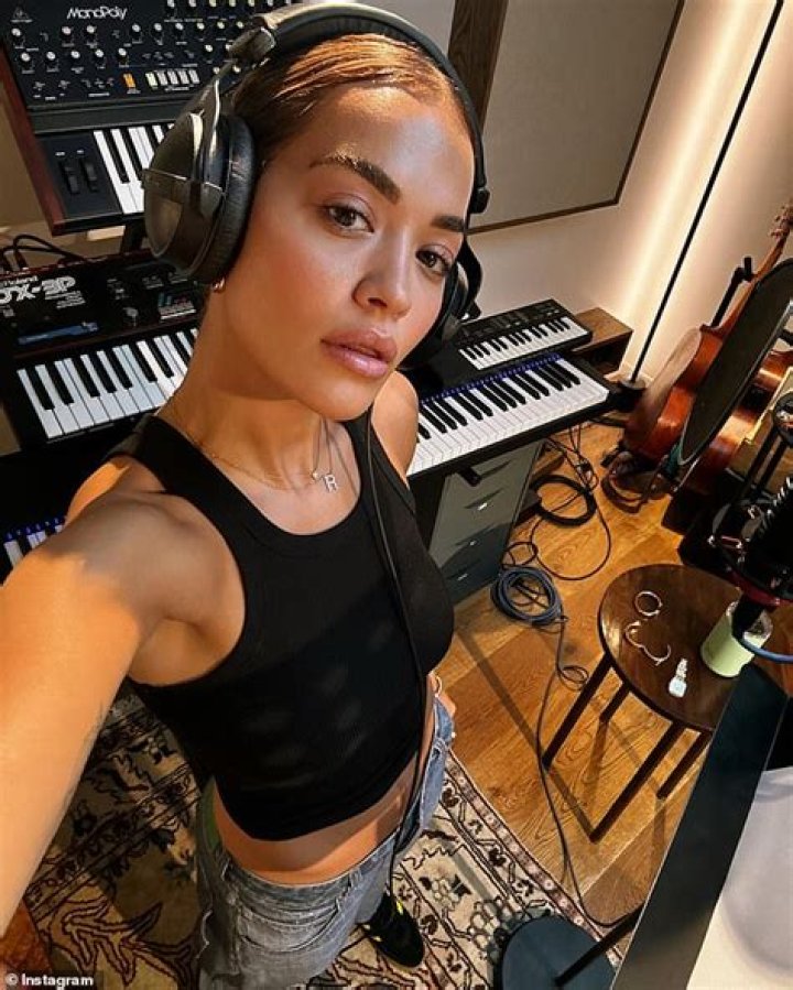 The singer shared snaps of her in a revealing wrap top and matching high-waisted bottoms