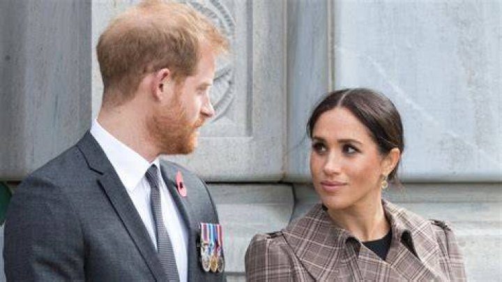 The Sussexes put their masks back on after the photos were taken