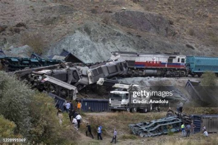 The train tipped over onto its side after colliding with a dump truck