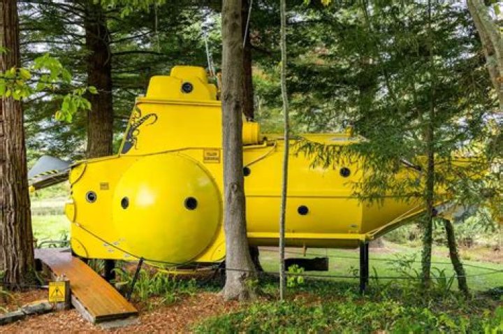 The yellow submarine tiny-home was built by Keith Lovelock out of scrap materials