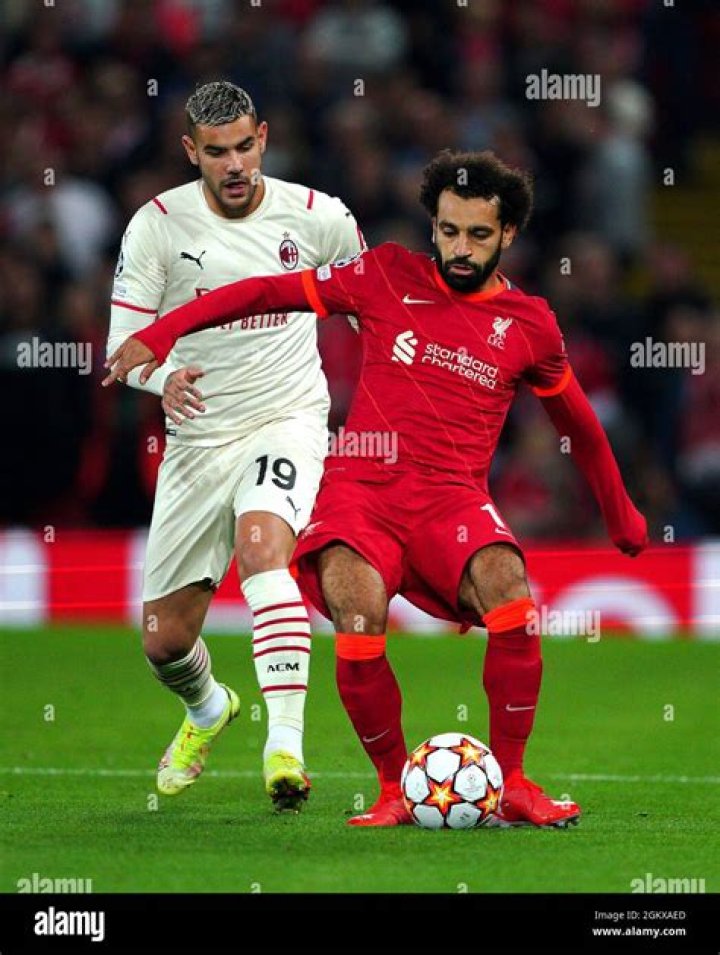 Theo Hernandez chases Mo Salah during a recent Champions League clash