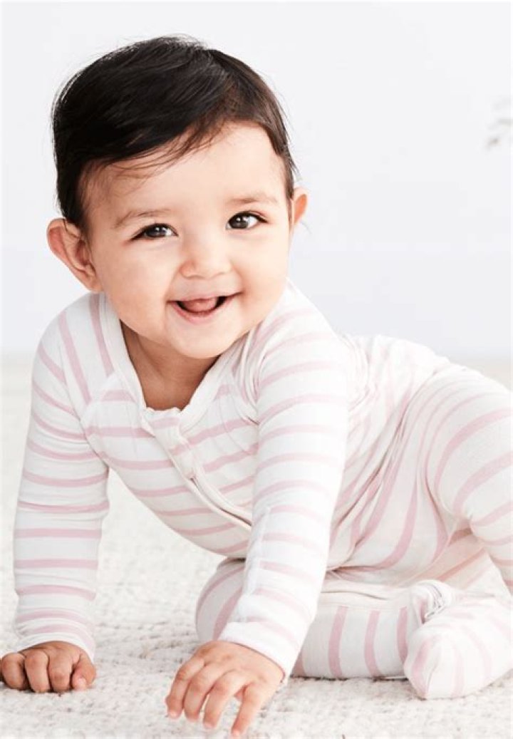 This Boody babygrow covers the baby with built-in feet and fold over mittens to prevent self-scratches from tiny nails