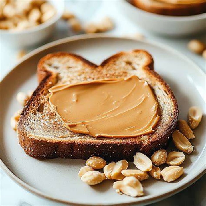 Toast and peanut butter will keep you satisfied till your next meal
