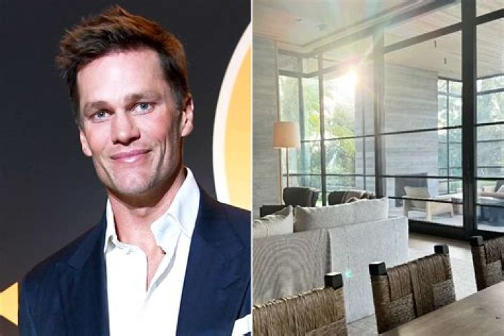 Tom Brady sitting inside his 2009 Audi R8 that's valued at $165,000