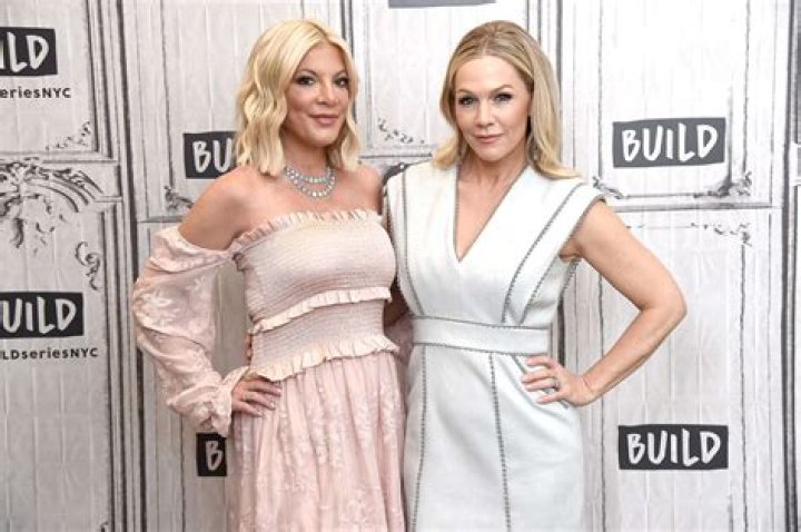 Tori Spelling and Jennie Garth Wearing Clothes With Donna and Kelly Written on Them Say Aaron Spelling Would Be Proud BH90210