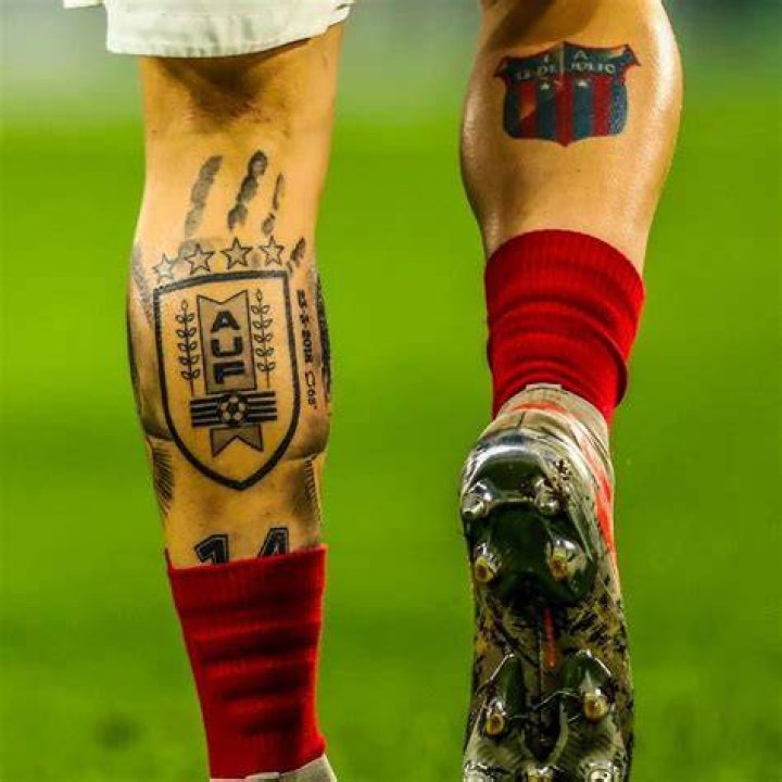  Torreira has another tattoo on his left leg, possibly of his father