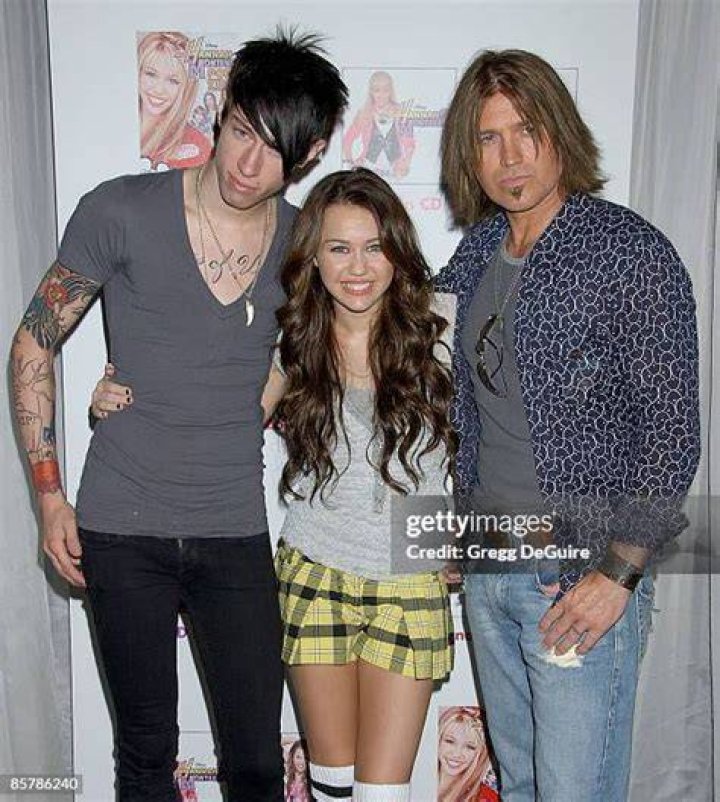 Trace Cyrus and Miley Cyrus at the Tom Ford AW20 Show at Milk Studios on February 07, 2020, in Hollywood, California