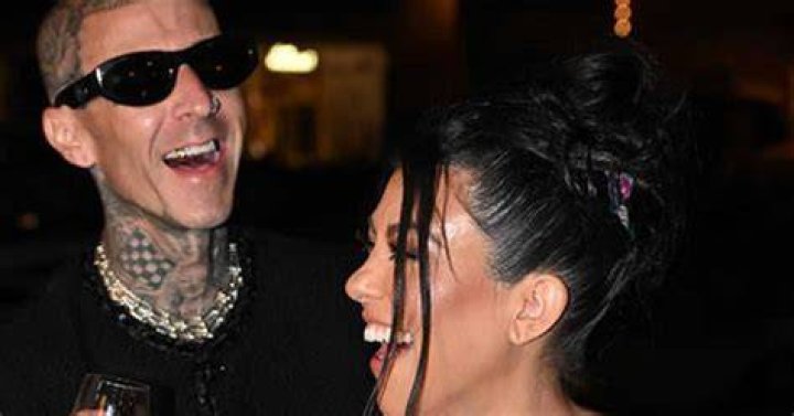 Travis and Kourtney were laughing together