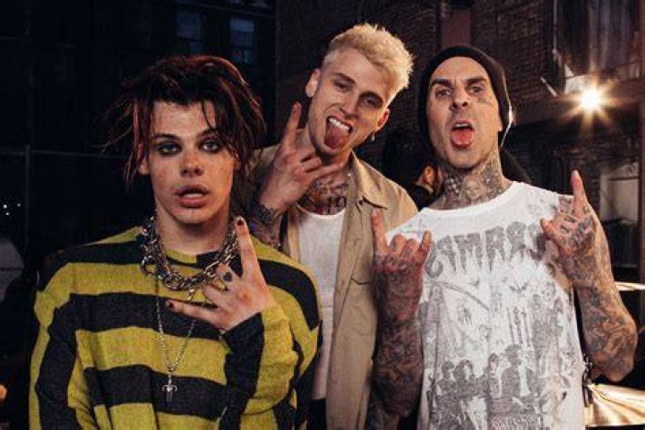 Travis Barker Machine Gun Kelly Get Matching Tattoos Born With Horns Album