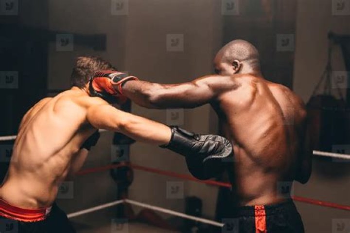  Two men throw punches