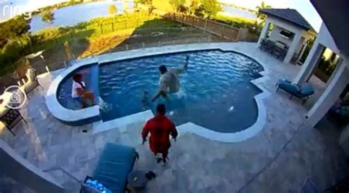 Video footage showed Drummond jumping into the water to save his son from drowning