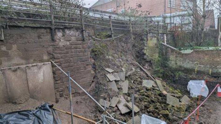 Walls have reportedly collapsed and explosions were heard as firefighters battle the raging fire