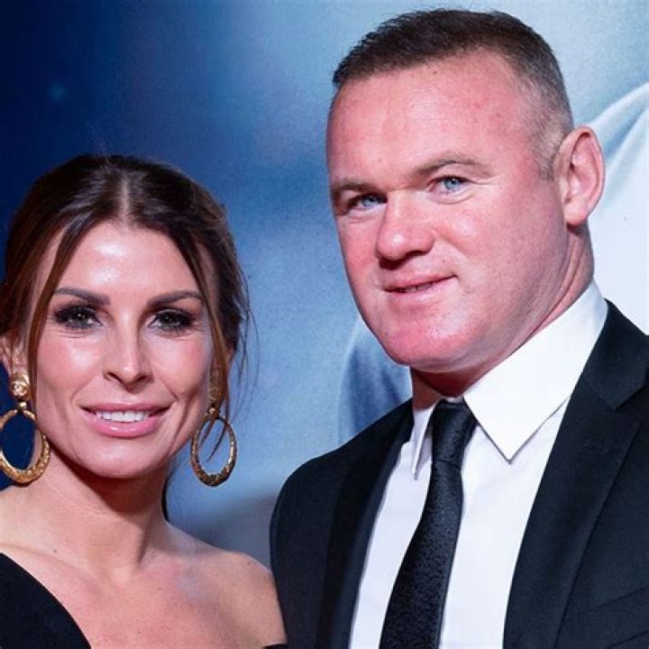 Wayne Rooney with his wife Coleen and their children