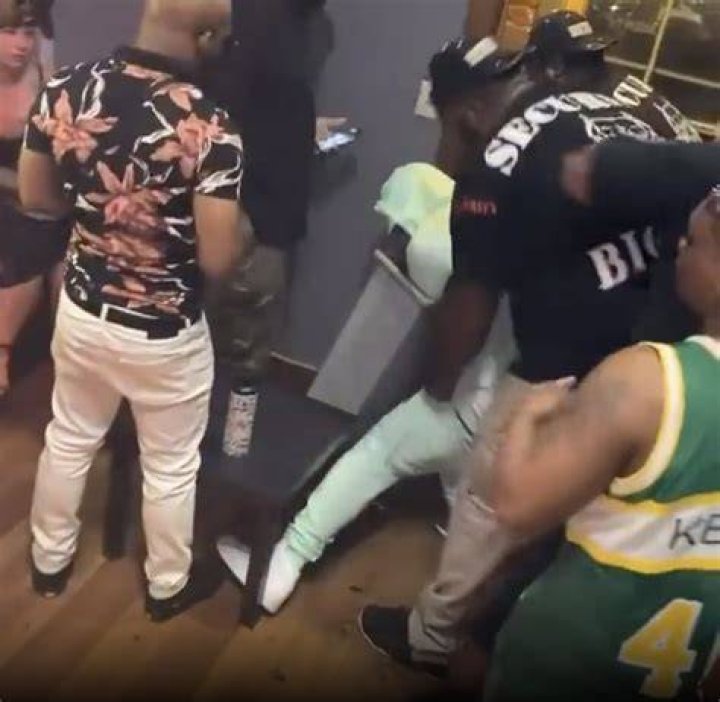 Webbie, dressed in white, appeared to collapse in the footage