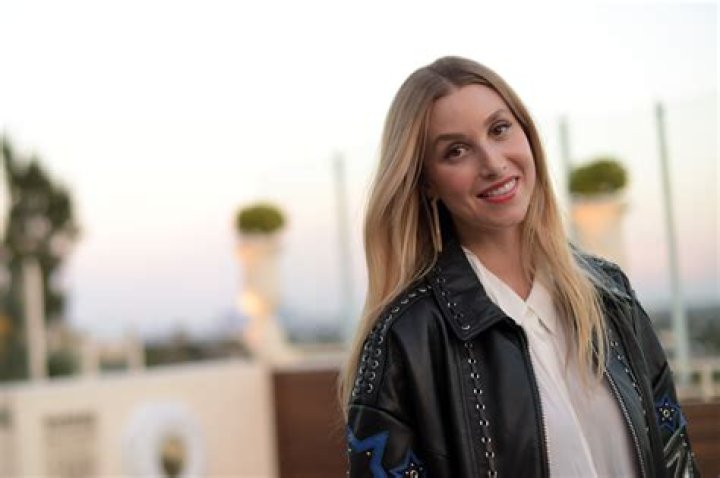 Whitney Port Applying Sunscreen