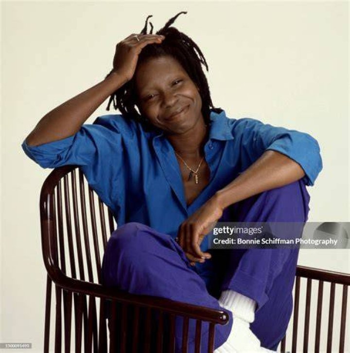 Whoopi Goldberg looked pretty in purple with a long ruffled dress