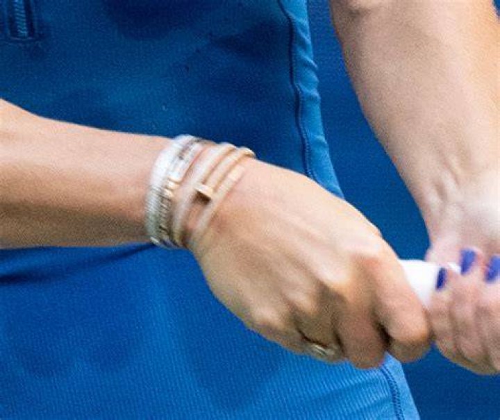 Wozniacki is rocking various bracelets on court