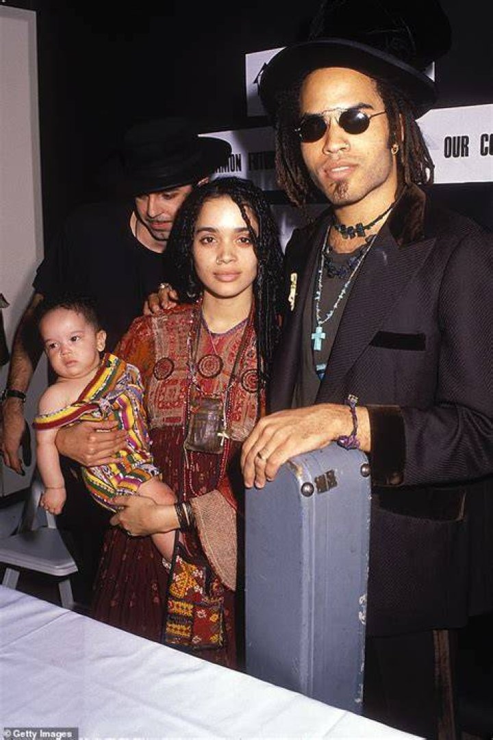  Zoe, pictured with her parents, is of mixed heritage